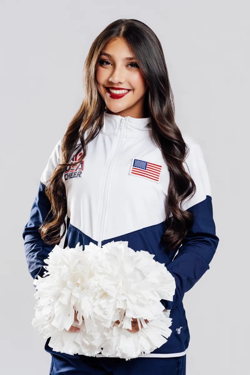 Maddie Hood in USA World Team jacket — LAHS Varsity Song, ICU World Championships 2026